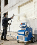 Top Tier Portable Polyurea And Polyurethane Spraying Machine For Efficient PU Foam Insulation Coating in use on wall.