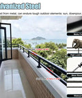 Level Up Your Outdoor Setup With This Super Sturdy Steel Balcony Railing Height Extender And Adjustable Patio Guard For Heavy Duty Deck Protection And Zero Hassle Install - Steel railings on balcony overlooking ocean.