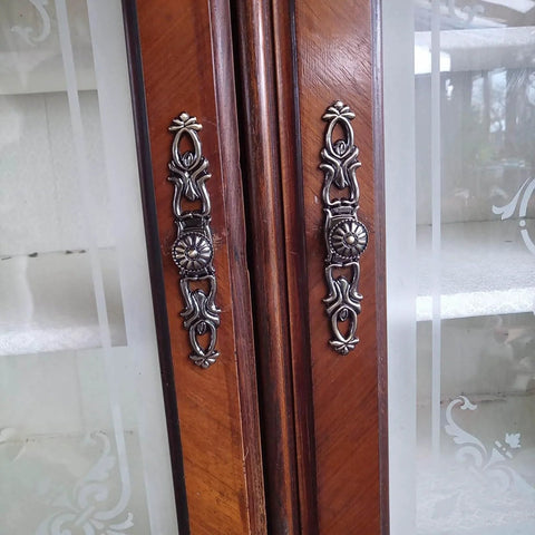 Antique Bronze Vintage Style Cabinet Knobs Set For Furniture Drawers Dressers Closets installed on wooden cabinet doors