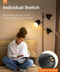 Woman reading beside Three 9W LED Bulbs Included Floor Lamp With 3 Adjustable Rotating Heads, satin nickel finish, 2400 lumens