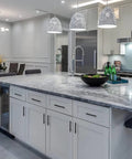 Modern kitchen with island featuring Matte Black Stainless Steel Cabinet Handles 25 Pack With 3 Inch Hole Center, 5 Inch Pulls.