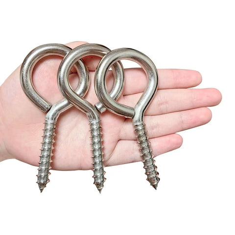 Hardcore Heavy Duty Eye Hooks And Snap Links That Are Legit Tough For Hammocks And Swings With Premium Grade Rust Proof Steel Spring Hooks in hand.