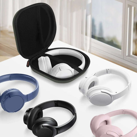 Heavy Duty Hard Shell Headphone Case, Tight Universal Travel Pouch With Rugged Quick Release Clip For On Ear And Over Ear Headphones, Compact Shock Proof Storage For Your Dope Audio Gear with mixed headphones inside.