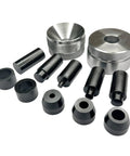 Professional Grade Badass Self Centering Coin Ring Hole Punch Tool parts including metal dies and tubes for jewelry making.