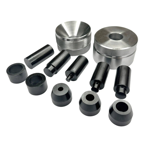 Professional Grade Badass Self Centering Coin Ring Hole Punch Tool parts including metal dies and tubes for jewelry making.