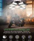 Ultra bright LED garage light highlighting motorcycle with energy-efficient features in an industrial setting.