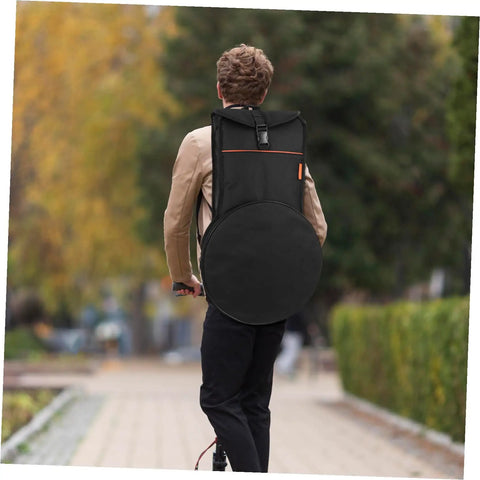 Person wearing a 12 Inch Practice Snare Drum Bag Built Like A Tank With No Sweat Waterproof Oxford Cloth on a path.