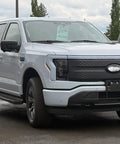 White Ford F-150 Lightning EV with Antenna Delete Cap For Ford F-150, SVT Raptor, And F-150 Lightning EV carwash ready feature