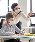 Teacher wearing UHF Wireless Headset Microphone System With 160 Feet Range in classroom, guiding students with masks.