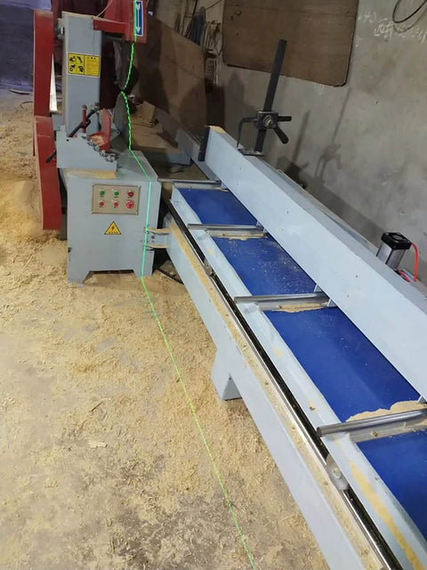 Green 520nm laser line module on a belt-driven cutting and engraving machine; control panel visible
