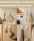 Top Shelf White Self Adhesive Wall Hooks Featuring Chic Paw And Oval Designs For Quick Snap Installation Stress Free Nano Adhesive Stripes Hang Heavy Tools Secured Without Scuffing Painted Surfaces Daily Must Have, displayed with kitchen items and key holder.