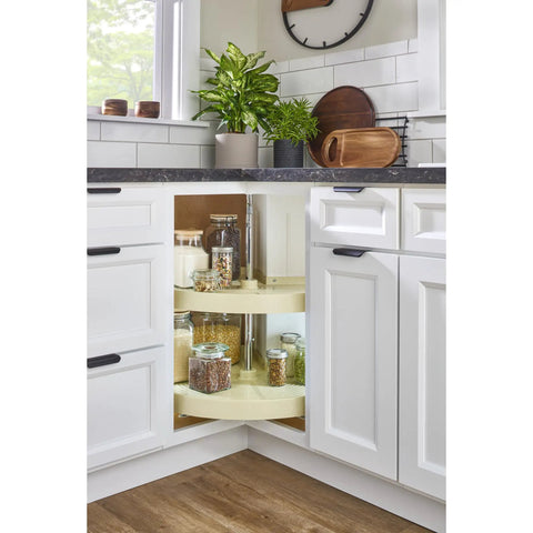 24 Inch Dual Tier Lazy Susan For Corner Kitchen Cabinets displaying jars on pie cut plastic pantry shelves in a stylish kitchen.