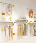 Top Shelf Wall Mounted Clothing Rack System Kit Crafted from Rock Solid Wrought Iron Pipes and Rugged Pine Boards for Boutique or Main Street Closets That Can Take Some Serious Wear and Tear, featuring a display of light attire.