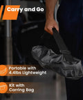 Person carrying Rechargeable Work Light With Stand Cordless Triple LED Lamp System in a black carrying bag.