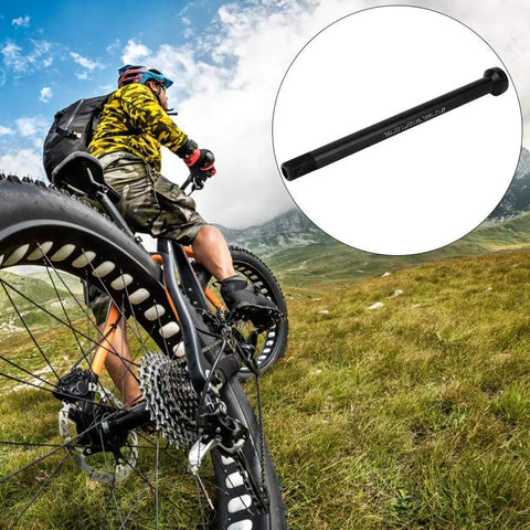 Cyclist on mountain trail with inset of 12 x 142mm Bicycle Thru Axle Adapter For Quick Release Rear Hub, aluminum alloy build