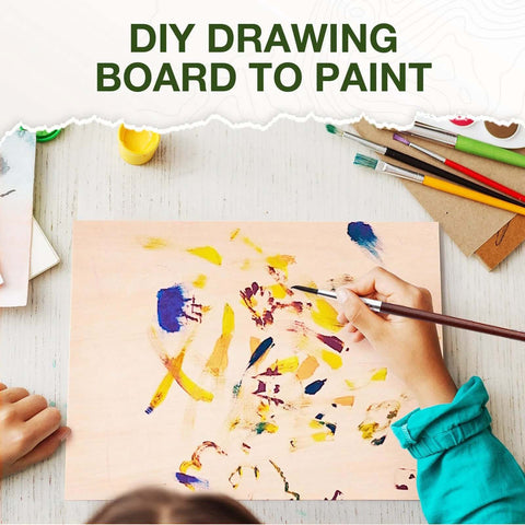 Wooden drawing board for painting; child hand with brush on light plywood panel with colorful abstract marks.