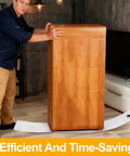 Two Pack Appliance Sliders With Pull Strap for easy moving of heavy furniture, showing glide block under wooden cabinet on tile floor.