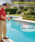 Man using Infrared Temperature Gun For Cookin And Grillin With Adjustable Emissivity, Fast 0.5 Second Readings by pool