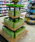 Straight Up Sturdy Four Tier Square Storage Rack Multi Purpose Steel Shelving Unit For Kitchen Warehouse Grocery Display with green boxes