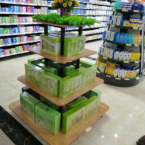 Straight Up Sturdy Four Tier Square Storage Rack Multi Purpose Steel Shelving Unit For Kitchen Warehouse Grocery Display with green boxes