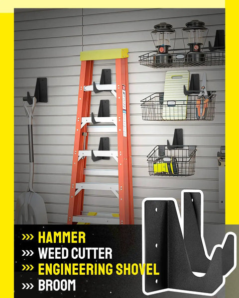 Garage wall storage system with hooks and baskets holding tools, ladder, and organizers on metal slat wall.