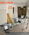 Air Scrubber Negative Air Machine With Three Stage Filtration And 16 Inch Inlet For Home Garage And Commercial Jobs 550 CFM HEPA And Activated Carbon Filters set up in sequence for daisy chaining in a construction area.