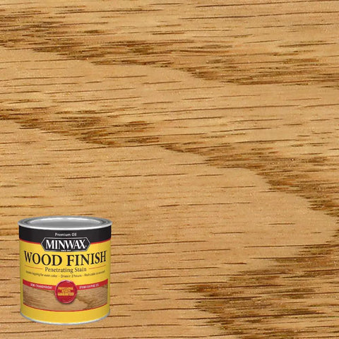 Slick Top Shelf Oil Based Wood Stain In Warm Ipswich Pine Shade shows smooth wood grain on a wood surface with can.