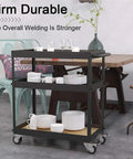 Three Tier Industrial Rolling Bar Cart With Thick Oak Shelves And Silent Casters For Living Room Hosting, filled with plates and cups.