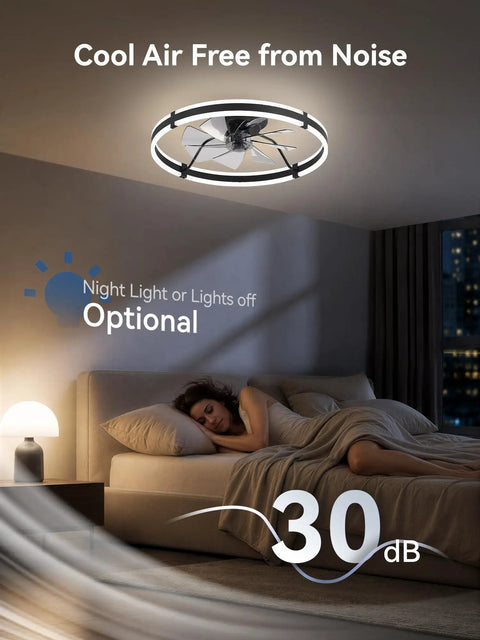 Modern 24 Inch Low Profile Ceiling Fan With Dimmable LED Light And Wireless Remote Slick Black Design above a bed, dim light ambiance.