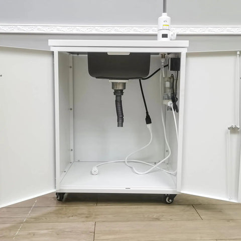 Underside view of Portable Mobile Hand Wash Station With Hot Water And Temperature Control Self Contained Sink Unit 24x18x39 Inches 110V Power Ideal For Schools Labs Clinics Hospitals Food Trucks Festivals showing pipes and wiring.