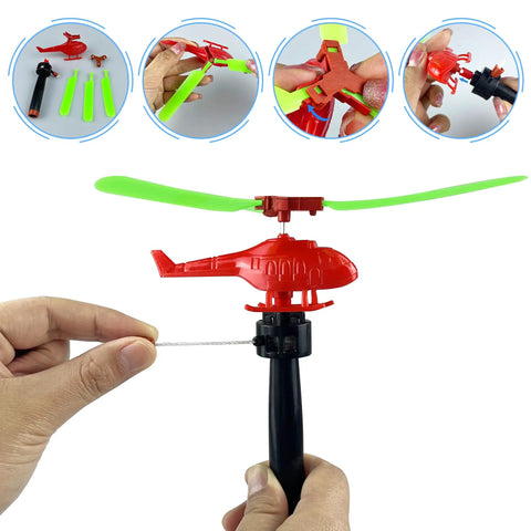 Close-up of a red helicopter toy with green blades from Colorful Helicopters And Airplanes Set With Launcher, 20 Flying Toys.