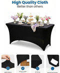 Black spandex tablecloth covering a 6ft table with flower arrangements and dishes for events, weddings, featuring secure leg pockets.