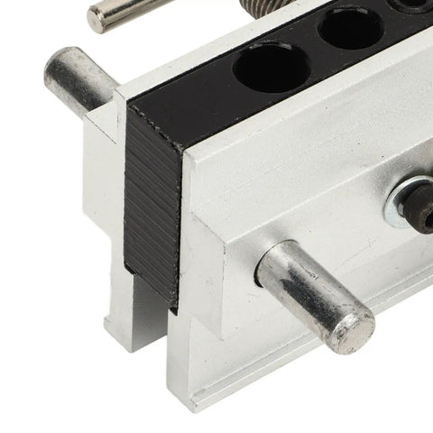 Close-up of Heavy Duty Self Centering Dowel Jig With Quick Swap Sleeves for precise woodworking tasks.