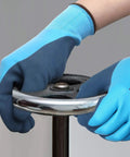 Waterproof Work Gloves With Hycool Grip Fully Dipped Latex For Dry Hands Slip Resistant Dexterity For Construction Gardening And Tech Work 3 Pairs Medium Blue Tough Comfortable All Weather PPE shown gripping a metal bar.