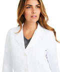 Womens White Lab Coat With Five Pockets Full Sleeve 5160 Flo Relaxed Fit Exam Coat For Medical Professionals Minimalist Collection XL Button Front Closure For Easy On And Off being worn by a woman