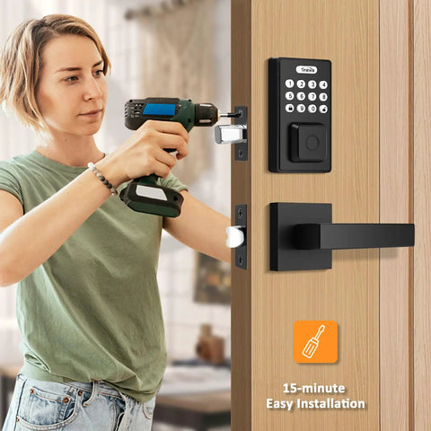 Person installing Keyless Entry Door Lock With Two Lever Handles, Fingerprint Entry Handleset, Digital Keypad Deadbolt With App, Auto Lock And One Touch Locking, Front Smart Door Handle Set, Black, No Fuss Easy To Use on a wooden door