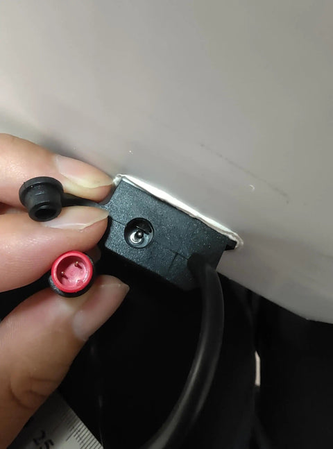 Close-up of connector for Ultra Thin Flexible CIGS Solar Panel Charger For Portable Power On The Go, showcasing detail and wiring.
