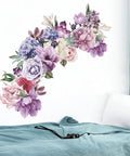 Giant Peony Wall Decals Four Piece Set With Watercolor Rose Blooms above bed in a living room, eco-friendly self-adhesive vinyl.
