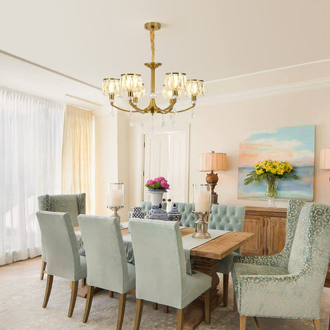 Gold Wagon Wheel Chandelier With 6 Lights, Clear Crystal Shades, in elegant dining room, Nordic Modern Mid Century design
