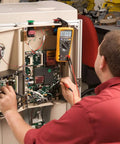 Technician using Industrial Electronics Multimeter Combo Kit With Probes And Hooks Six Piece DMM Set for Troubleshooting