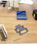 quiet heavy duty cabinet hinges on workbench with tools