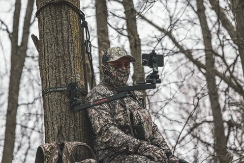 Camera Mounting Arm For Filming Hunts With Video Head No Fuss Lightweight Aluminum Build Beginner Arm For Small Cameras And Cell Phones Durable And Easy To Use Wide Range Of Motion For Smooth Shots mounted on a tree with smartphone