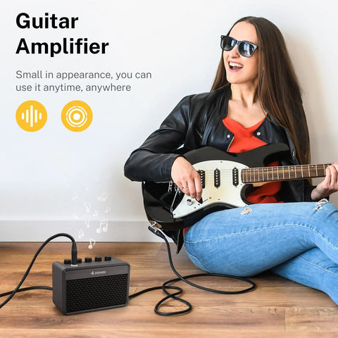 Woman playing electric guitar with Portable 5W Mini Guitar Amp For Practice Jam Ready Compact Electric Guitar Amplifier