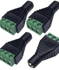 No Sweat Three Point Five Millimeter Stereo Jack To Screw Terminal Adapter for Quick Wiring Builds, four black adapters with green screw terminals.