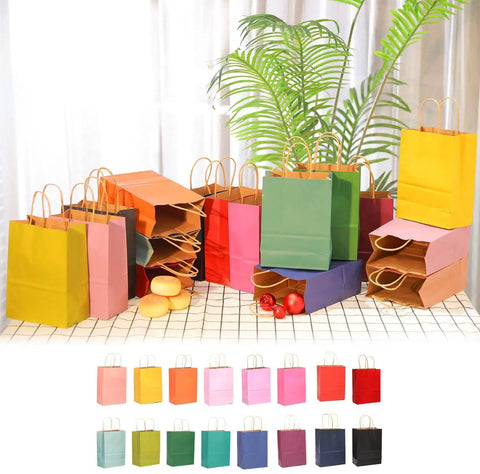 32 Pack Medium Gift Bags With Handles 7.6 X 4.75 X 10.5 Inch Assorted Color Paper Bags arranged on table