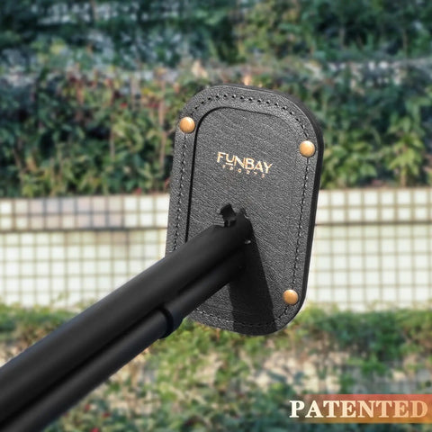 Close-up of Magnetic Leather Barrel Rest for Shotguns in use outdoors, ideal for Sporting Clays Trap Skeet and Five Stand.