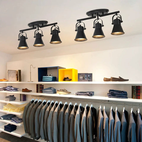 Three Light Black Track Lighting Kit With Rotatable Heads ceiling light in modern closet setting
