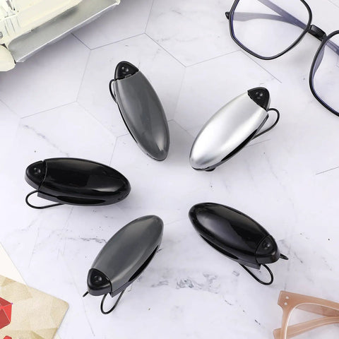 5-Piece Car Sun Visor Clip Holder Set For Glasses And Eyewear, Eyeglasses Mount And Card Clip in black, gray, and silver on table