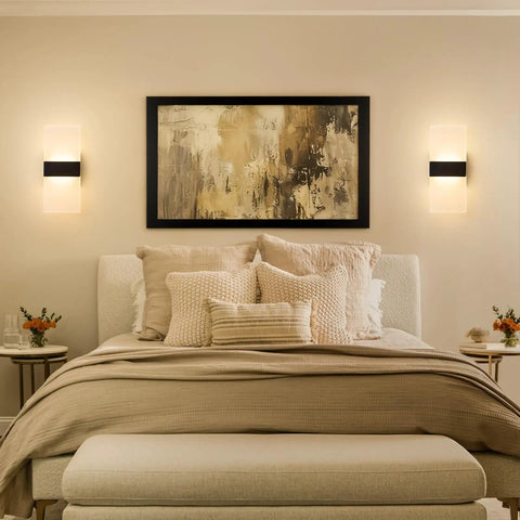 Sleek Black Modern LED Wall Sconce Dimmable Indoor Lighting Adjustable 5CCT Shade Hardwired Wall Lamp For Living Room Bedroom Bathroom Damp Rated 12 Inch beside bed with decorative pillows and a painting.
