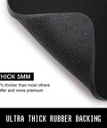 Close-up of Thick Anti Slip Five Millimeter Gaming Mouse Pad With Stitched Edges And Non Slip Rubber Base Eight Point Three By Ten Point Two Inch showing textured underside.